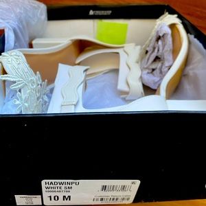 White block heels with lace. Zipper on back